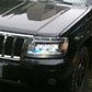 For 99-04 Jeep Grand Cherokee Headlight Assembly Retrofit with LED Projector, Daytime Running Lights, and Dynamic Turn Signals